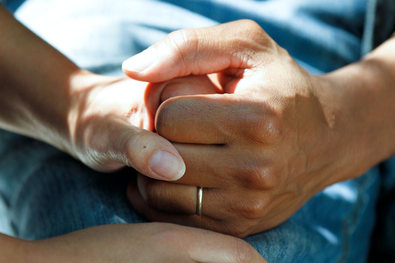 Holding hands in a healthcare setting